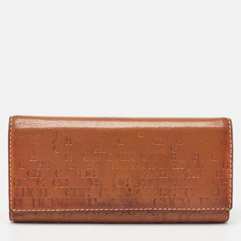 Wallets with premium leather-Handmade wallets for women-Ch Carolina Herrera Brown Monogram Embossed Leather Trifold Continental Wallet