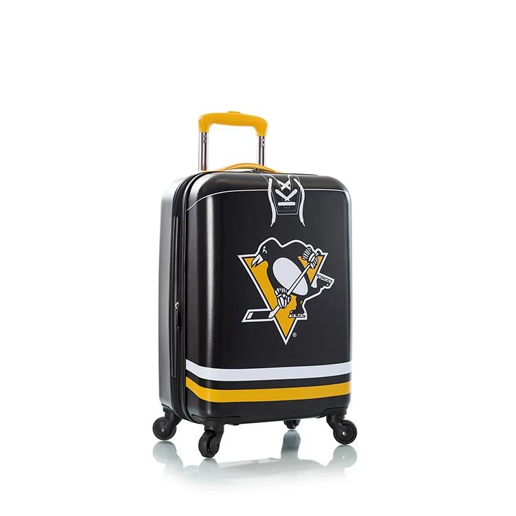 Suitcase for workout clothes-minimalist suitcase-Heys NHL 21" Pittsburgh Penguins Carry On Spinner Luggage