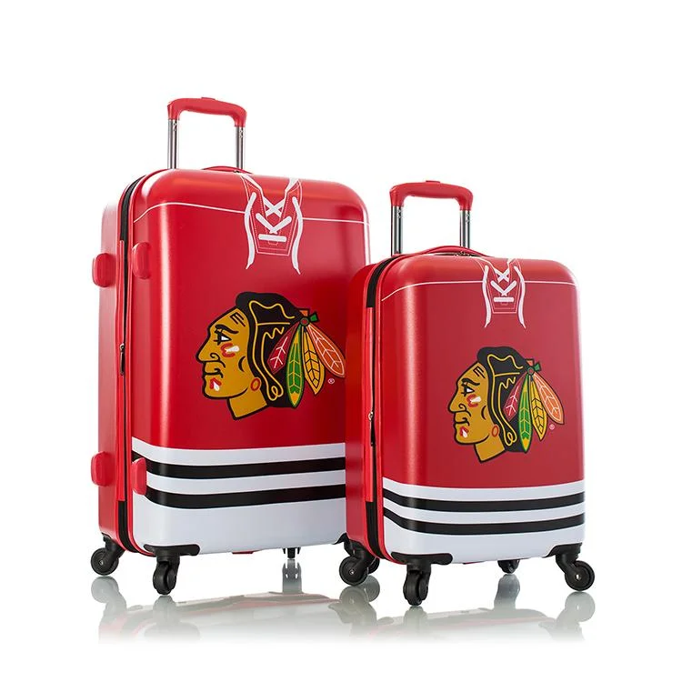 Suitcase for quick trips-suitcase for adventure travel-Heys NHL 2pc Chicago Blackhawks Spinner Luggage Set